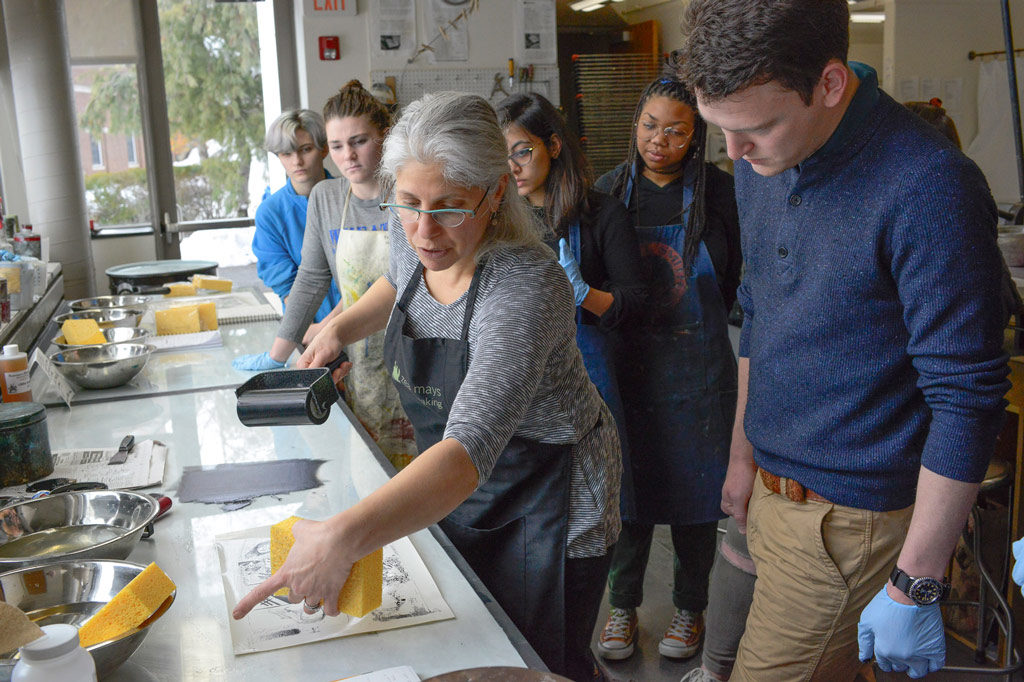 Professor Claudi Fieo with students