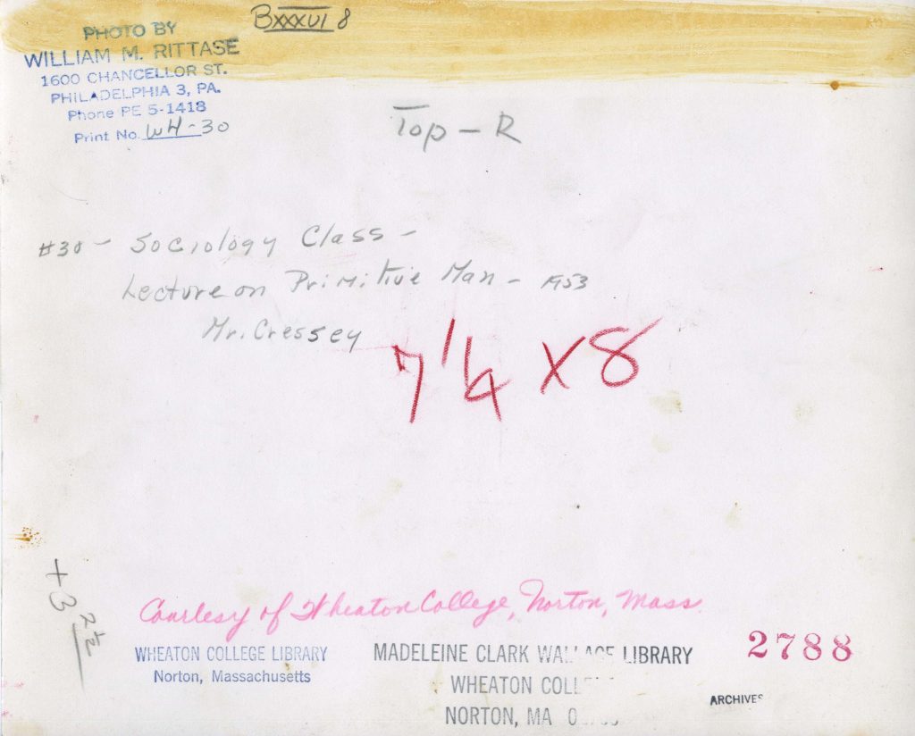 Verso of Photograph. Hand written description of image.