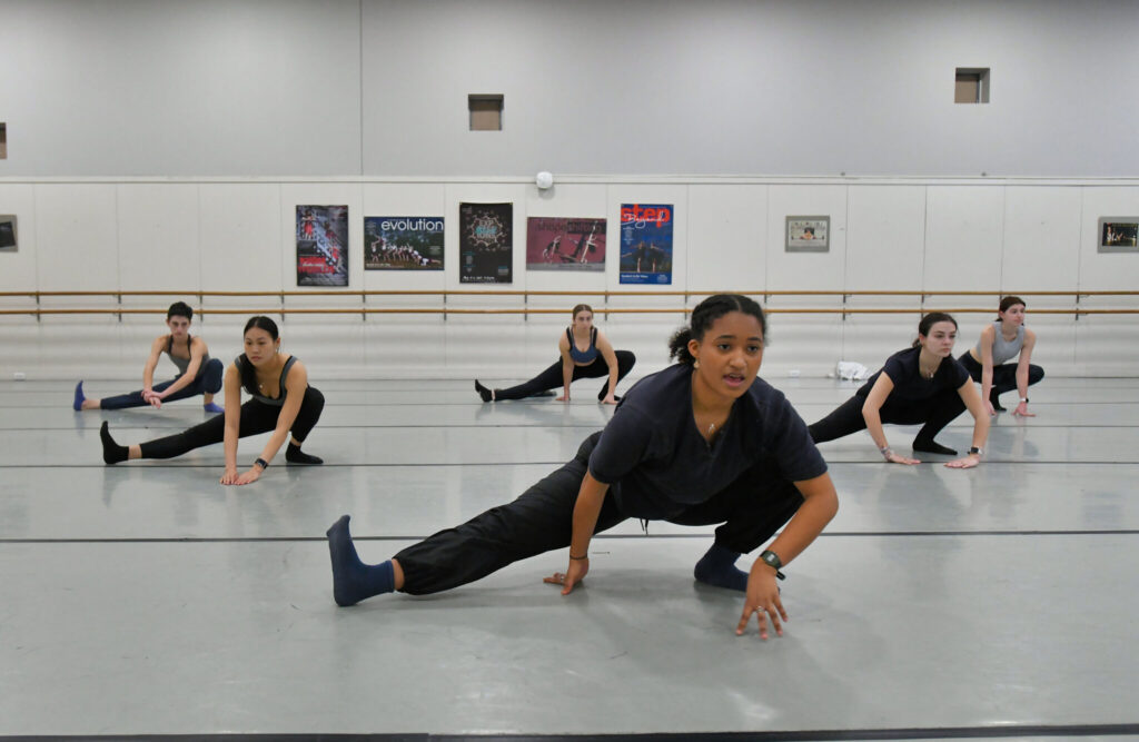 Izzi King ’22, a dancer with Urbanity Dance in Boston, works with members of the Wheaton College