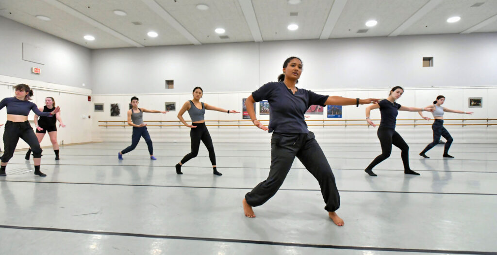 Izzi King ’22, a dancer with Urbanity Dance in Boston, works with members of the Wheaton College