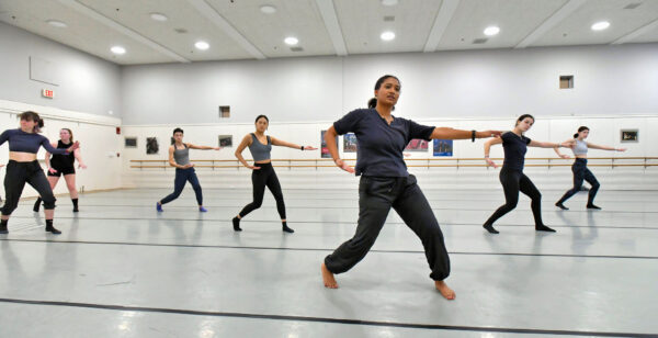 Izzi King ’22, a dancer with Urbanity Dance in Boston, works with members of the Wheaton College