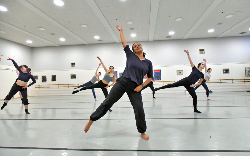 Izzi King ’22, a dancer with Urbanity Dance in Boston, works with members of the Wheaton College