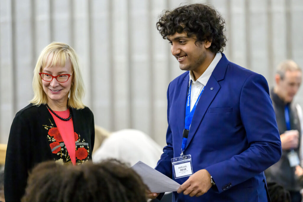President Michaele Whelan and student Dhwanil Shah '27