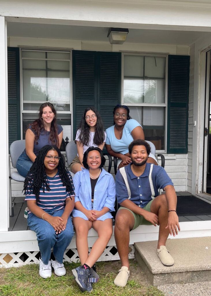 Gropu of First Gen students sitting on stairs