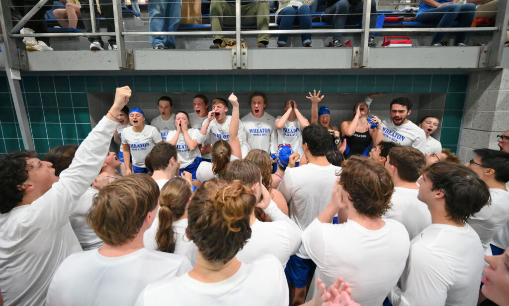 Wheaton College swim team celebrating